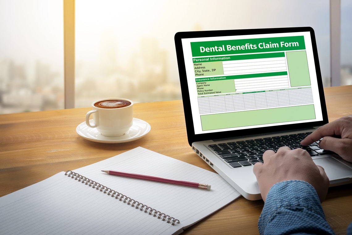 dental-benefits-claim-form-document-dental-computing-computer-flare-sun-cropped-image-male-freelance
