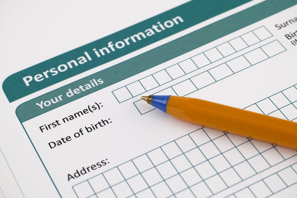 personal-information-form-with-ballpoint-pen