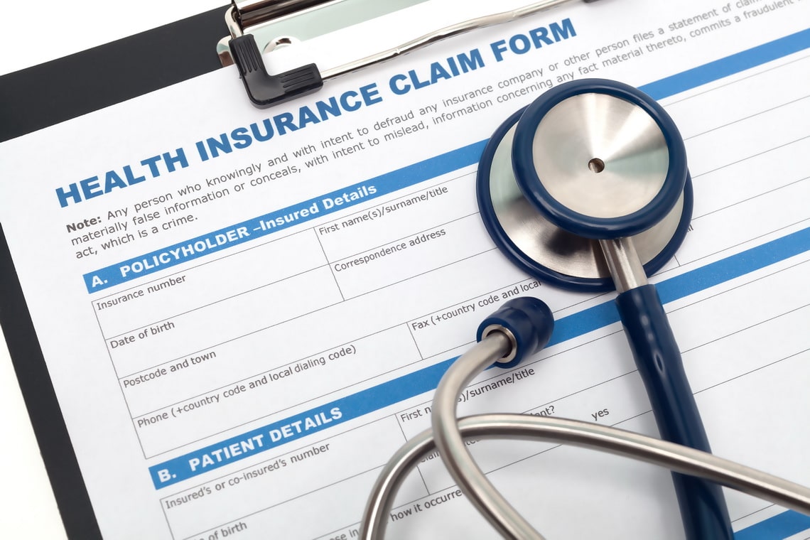 medical-and-health-insurance-claim-form-with-stethoscope-on-clipboard